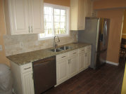 Alpharetta kitchen remodeling, cabinets, granite countertops, kitchen backsplash installation, laminet floor installation